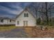 White detached garage with double doors at 12178 Brown Bridge Rd, Covington, GA 30016