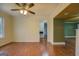 Bright dining room with hardwood floors and wainscoting at 12178 Brown Bridge Rd, Covington, GA 30016