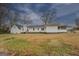 Back of the house, showcasing a large yard at 12178 Brown Bridge Rd, Covington, GA 30016