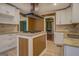 Updated kitchen with island, granite counters, and new appliances at 12178 Brown Bridge Rd, Covington, GA 30016