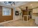 Renovated kitchen with white cabinets, granite counters, and an island at 12178 Brown Bridge Rd, Covington, GA 30016