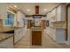 Modern kitchen featuring white cabinets, granite countertops, and a gas range at 12178 Brown Bridge Rd, Covington, GA 30016