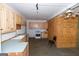 Basic kitchen with light wood cabinets and gas range at 12178 Brown Bridge Rd, Covington, GA 30016