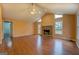 Living room with hardwood floors, stone fireplace and access to backyard at 12178 Brown Bridge Rd, Covington, GA 30016