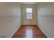 Spacious walk-in closet with wire shelving and window at 12178 Brown Bridge Rd, Covington, GA 30016