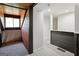 Upper hallway with wood and gray accents and window at 1512 Flat Shoals Rd, Atlanta, GA 30349