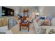 Cozy living room boasts comfortable seating, area rug and television at 4128 Pemberton Dr, Covington, GA 30014