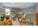 Comfortable living room with neutral colors and lots of natural light from the window at 4128 Pemberton Dr, Covington, GA 30014