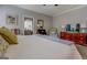 Light and airy bedroom with wood floors, neutral paint, and comfortable, stylish furnishings at 4128 Pemberton Dr, Covington, GA 30014