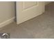 White closet door with carpet flooring at 9168 Carr Cir, Covington, GA 30014