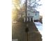 Front view of house with mailbox, driveway, and parked car at 9168 Carr Cir, Covington, GA 30014