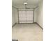 Attached garage with automatic door opener at 9168 Carr Cir, Covington, GA 30014