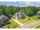 An aerial view displays this home's proximity to neighboring houses in a well-maintained community at 4051 Rotterdam Pass, Hampton, GA 30228