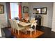 Elegant dining room with a stone table and patterned chairs at 4051 Rotterdam Pass, Hampton, GA 30228