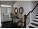 Bright and airy entryway with dark hardwood floors at 4051 Rotterdam Pass, Hampton, GA 30228