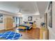 Spacious main bedroom features hardwood floors, tray ceilings, and stylish decor at 4051 Rotterdam Pass, Hampton, GA 30228