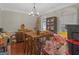 Dining room with table, chairs, and storage at 10 Toscanno Dr, Covington, GA 30014