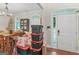 Entryway with storage containers and a view into the dining area at 10 Toscanno Dr, Covington, GA 30014