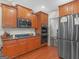Kitchen with stainless steel appliances and hardwood floors at 10 Toscanno Dr, Covington, GA 30014