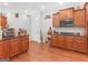 Kitchen with stainless steel appliances and hardwood floors at 10 Toscanno Dr, Covington, GA 30014