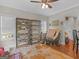 Bright living room with hardwood floors and shelving at 10 Toscanno Dr, Covington, GA 30014