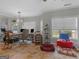 Home office with hardwood floors and lots of natural light at 10 Toscanno Dr, Covington, GA 30014