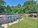 Large above ground pool with gazebo at 10 Toscanno Dr, Covington, GA 30014
