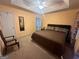 Primary bedroom with king-size bed and ceiling fan at 4768 Redbranch Rd, Decatur, GA 30035