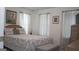 Bright bedroom with double bed and window coverings at 4768 Redbranch Rd, Decatur, GA 30035