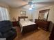 Bedroom with full-size bed and dresser at 4768 Redbranch Rd, Decatur, GA 30035