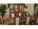 Formal dining room with a large wood table and hutch at 4768 Redbranch Rd, Decatur, GA 30035