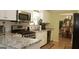 Kitchen with granite countertops and stainless steel appliances at 4768 Redbranch Rd, Decatur, GA 30035