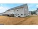 Townhouse backyard with patio and small grass area at 3170 Fareed St, Douglasville, GA 30135