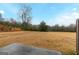 Large backyard with small patio and treeline view at 3170 Fareed St, Douglasville, GA 30135