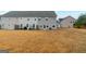 Townhouse backyard with patio and small grass area at 3170 Fareed St, Douglasville, GA 30135