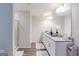 Elegant bathroom boasting double vanity and granite countertops at 3170 Fareed St, Douglasville, GA 30135