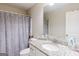 Clean bathroom with shower, single vanity, and granite top at 3170 Fareed St, Douglasville, GA 30135