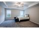 Spacious bedroom with ceiling fan and carpet flooring at 3170 Fareed St, Douglasville, GA 30135