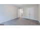Spacious bedroom with double door closet and neutral decor at 3170 Fareed St, Douglasville, GA 30135