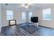 Living room features hardwood floors and plenty of natural light at 3170 Fareed St, Douglasville, GA 30135
