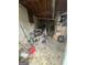 Unfinished basement with concrete flooring and exposed ceiling offers storage and utility space at 1551 Ferno Nw Dr, Atlanta, GA 30318