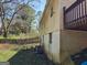 Back exterior view featuring a walk out deck, a basement, and wood panel siding at 1551 Ferno Nw Dr, Atlanta, GA 30318