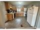 Functional kitchen features appliances and wood cabinets at 1551 Ferno Nw Dr, Atlanta, GA 30318