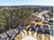 Wide aerial view of a neighborhood with houses and trees at 845 Hillandale Ln, Lithonia, GA 30058