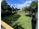 Large backyard with green grass and wooden fence at 3772 Saddle Ridge Dr, Snellville, GA 30039