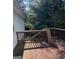 Wooden deck overlooks backyard and wooded area at 3772 Saddle Ridge Dr, Snellville, GA 30039