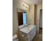 Bathroom with vanity, sink, and mirrored medicine cabinet at 3772 Saddle Ridge, Snellville, GA 30039