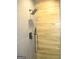 Contemporary shower with black fixtures and wood-look tile at 4490 Latchwood Dr, Lithonia, GA 30038