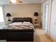 Large main bedroom with a king-size bed and ensuite bathroom at 4767 Glenwhite Dr, Duluth, GA 30096