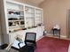 Home office with built-in shelving and workspace at 4767 Glenwhite Dr, Duluth, GA 30096